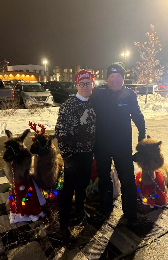 State Representative Danny Nadeau and Mayor Ryan Sabas with festive llamas at Christmas at the Crossings in Champlin