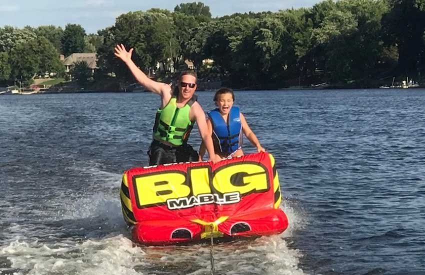 Ryan Sabas and his daughter tubing on the Mississippi River