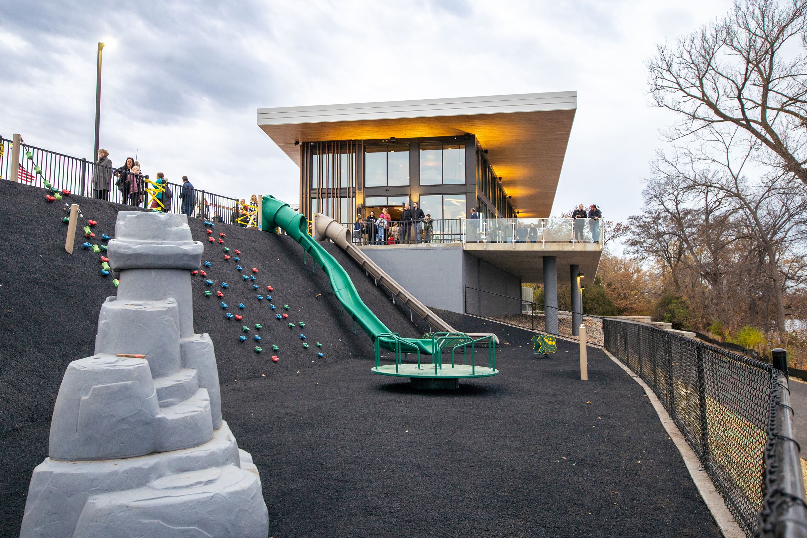 Children's playground with a hillside slide next to the Mississippi Crossings Event Center in Champlin