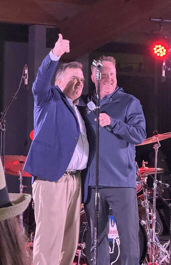 Mayor Ryan Sabas and Senator John Hoffman on stage at Mississippi Crossings