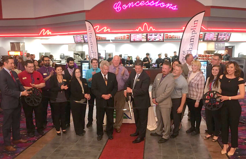 Ribbon cutting ceremony at Mann Theatres in Champlin with City of Champlin officials